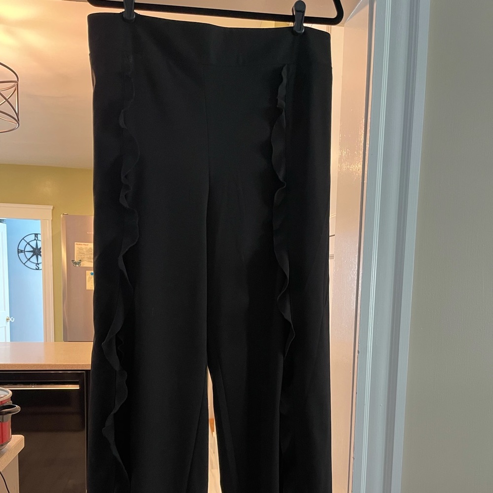 Black ruffle front slit pants